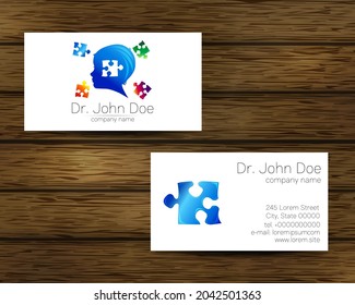 Psychology vector visit card Puzzle Autism Modern logo. Creative style. Design concept for Brand company. Blue color isolated on tree background. Symbol for web, print. vVsiting personal set
