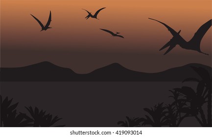 pterodactyl fly at the night scenery with brown backgrounds