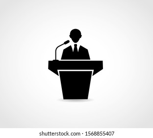 Public orator flat vector icon. Public speaker with microphone  from tribune illustration.