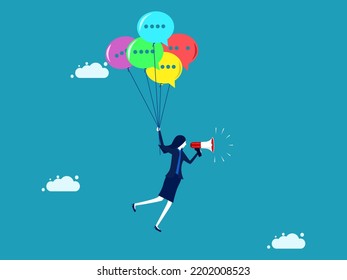 public relations. businesswoman floats a speech balloon and talks through a megaphone