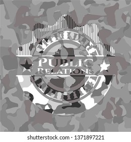 Public Relations on grey camouflaged texture