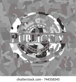 Publicity on grey camo texture