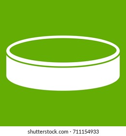 Puck icon white isolated on green background. Vector illustration