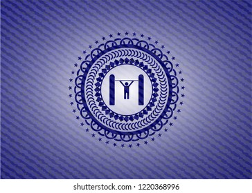 pull up icon inside badge with denim background