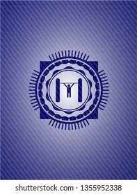 pull up icon inside badge with denim background