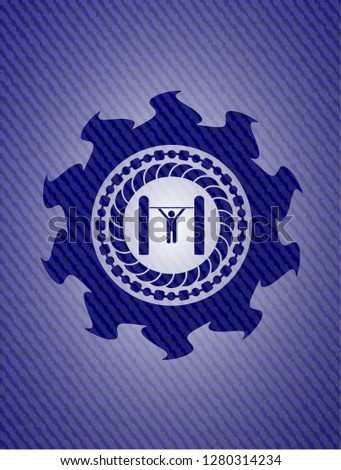 pull up icon inside badge with denim texture