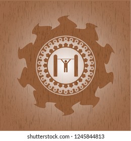 pull up icon inside badge with wood background