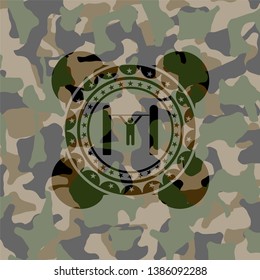 pull up icon inside camouflaged emblem