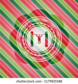 pull up icon inside christmas colors badge.