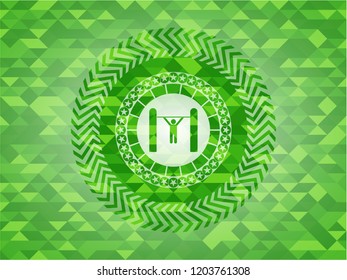 pull up icon inside green mosaic emblem