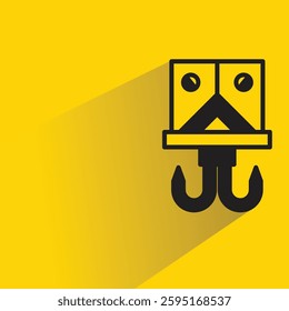 pulley crane hook icon on shadow yellow background