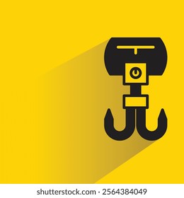 pulley and hoist icon with shadow on yellow background