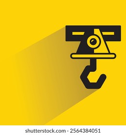 pulley and hoist icon with shadow on yellow background