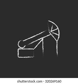 Pump jack oil crane hand drawn in chalk on a blackboard vector white icon isolated on a black background.