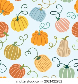 Pumpkin autumn seamless pattern on blue background. Pumpkin texture