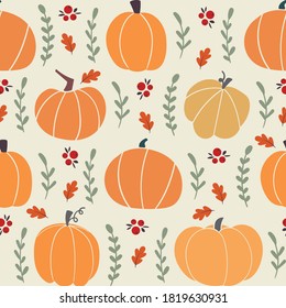 Pumpkin and baries seamless pattern on a beige background. Autumn vector pattern with orange and yellow pumpkins. Halloween pattern with warm trending color.