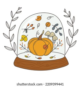 Pumpkin in a glass ball. Autumn composition in miniature