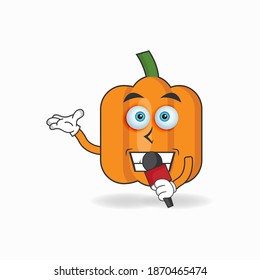 The Pumpkin mascot character becomes a host. vector illustration