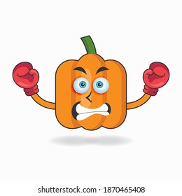 Pumpkin mascot character with boxing gear. vector illustration