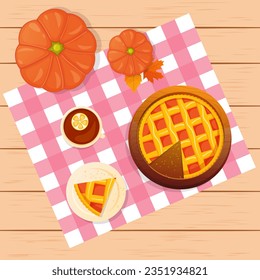 Pumpkin pie with tea on the wooden background