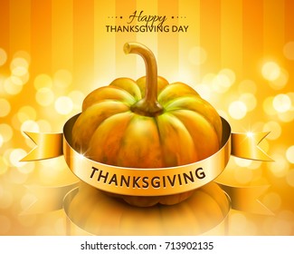 Pumpkin and ribbon thanksgiving day card design with Golden bokeh glittery sparkles background.