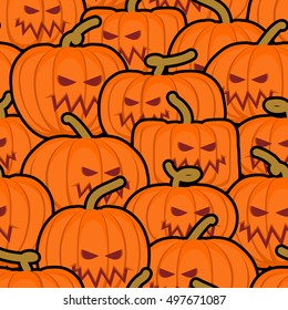 Pumpkin seamless pattern. Halloween background. Scary vegetable texture. Terrible holiday ornament