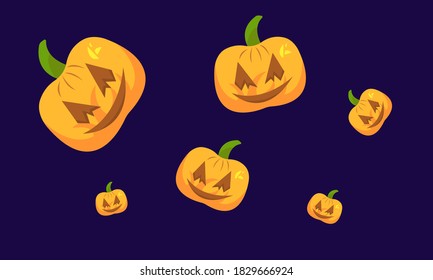 pumpkins for halloween with cut eyes and smiles on dark blue background concept of festive night wallpaper for design