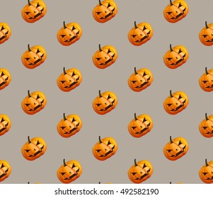 Pumpkins for Halloween seamless pattern background. Vector Illustration