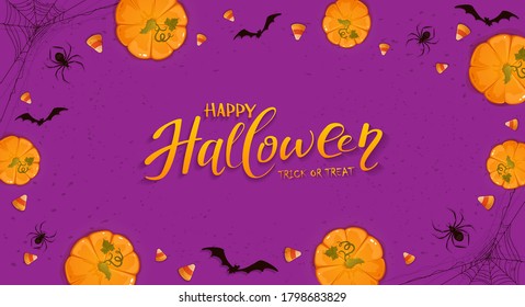 Pumpkins on purple Halloween background with candies, bats and spiders. Card with Jack O' Lanterns and lettering Happy Halloween. Illustration can be used for children's holiday design, banners, cards