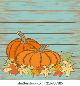 Pumpkins on wooden background with leaves. Autumn background. Vector.