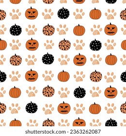 Pumpkins and paws. Happy Halloween seamless fabric design pattern