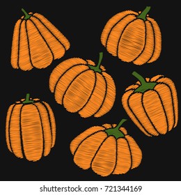 Pumpkins set. Embroidery on dark background. Vector illustration
