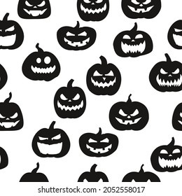 Pumpkins and white background. Vector seamless pumpkins pattern. Black Halloween pumpkins silhouettes wallpaper.