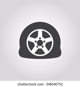 Puncture wheel icon. 
