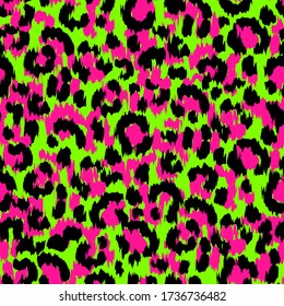 Punk style animal print with neon pink and green hand drawn spots. 80s style leopard print. Vector seamless tile pattern.