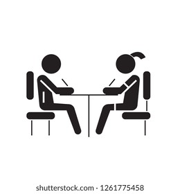 Pupil in school at desk black vector concept icon. Pupil in school at desk flat illustration, sign