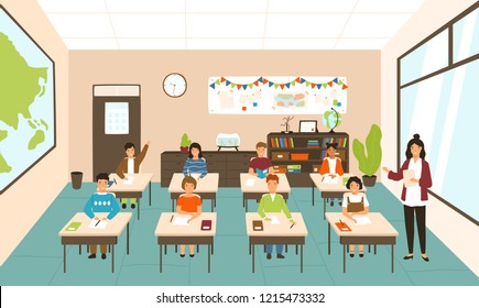 Pupils sitting at desks in modern classroom, young female teacher teaching them. Elementary school boys and girls studying on lesson in class. Colorful vector illustration in flat cartoon style.