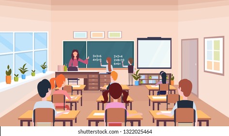 pupils solving math problem on chalkboard during lesson education concept modern school classroom interior male female cartoon characters horizontal flat