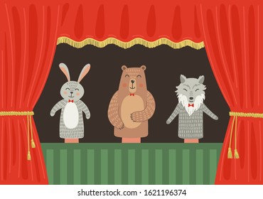Puppet theatre. Forest animals: rabbit, wolf and bear on the scene with red curtain. 