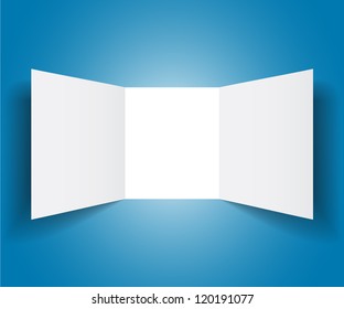 Pure white booklet on blue background