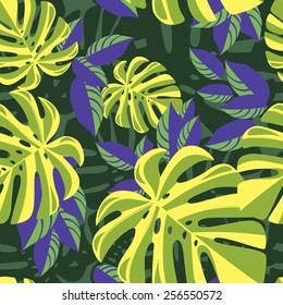 Purple and green tropical foliage pattern on green background