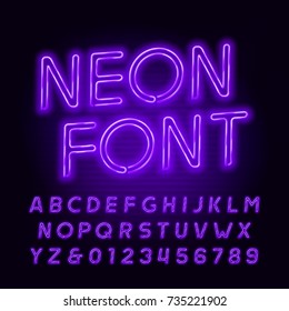 Purple neon tube alphabet font. Neon color oblique letters and numbers. Stock vector typeface for your headers or any typography design.