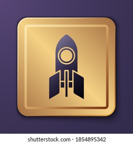 Purple Rocket ship icon isolated on purple background. Space travel. Gold square button. Vector