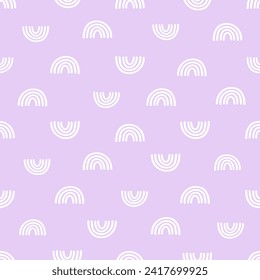 Purple seamless pattern with hand drawn rainbows