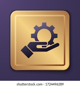 Purple Settings in the hand icon isolated on purple background. Gold square button. Vector Illustration