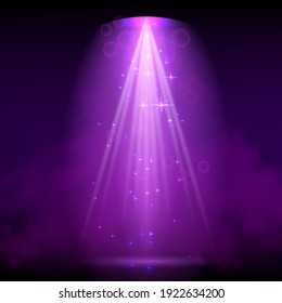 Purple spotlight. Bright lighting with spotlights of the stage with purple dust on dark background