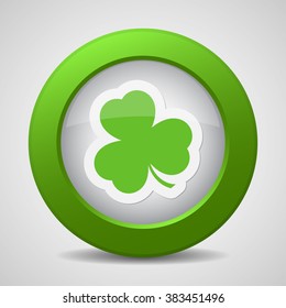 push button with the green shamrock on a white background