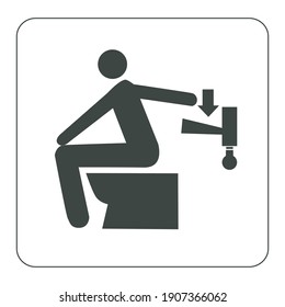 Push the lever for flushing sign mounted on toilet room 