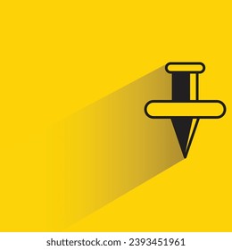 icono del pin de inserción con sombra sobre fondo amarillo