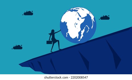pushing the world economy out of the crisis. Businesswoman pushing the world from falling
